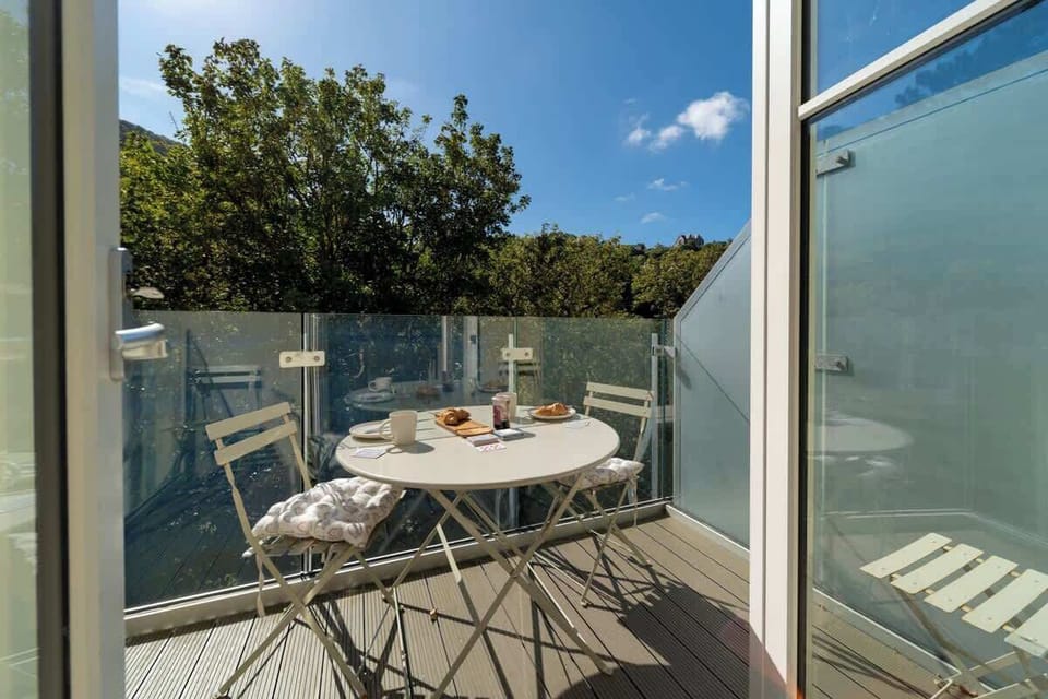 Enjoy stunning valley views from your private balcony, where tranquility and natural beauty create the perfect retreat.