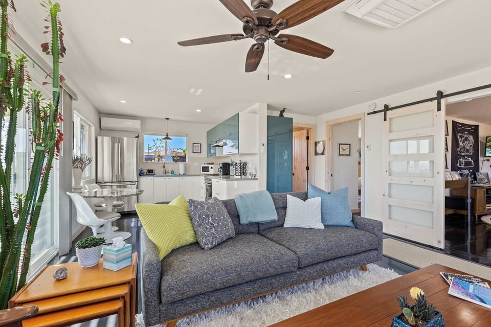 Main living area flows into the music/TV room