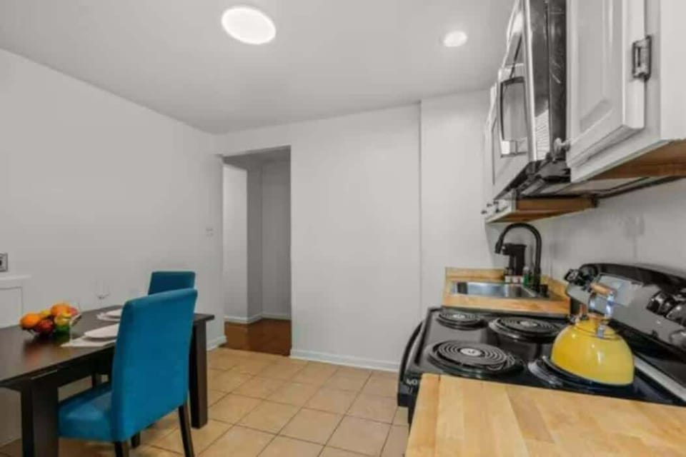 Gather around the table and enjoy a delicious meal with our beautifully designed dining and kitchen space