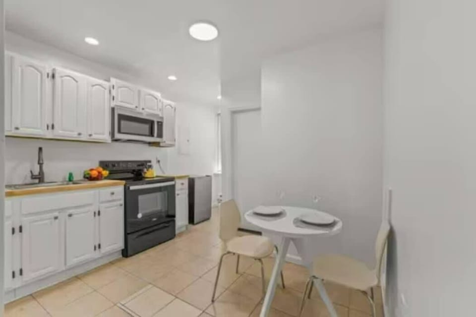 Gather around the table and enjoy a delicious meal with our beautifully designed dining and kitchen space