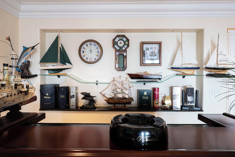 Quirky decor and model ships add a playful, maritime vibe to the space.