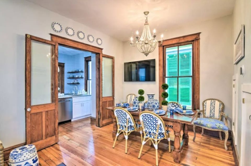 Elegant dining space with historic charm and wood floors
