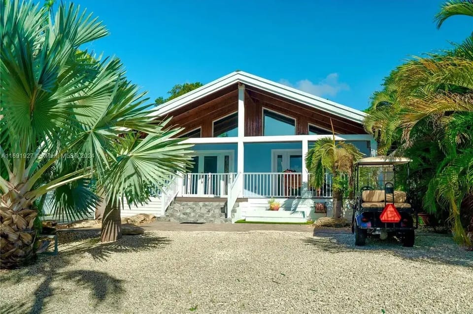 Southern exposure, a wraparound porch and an oversized lot on a quiet street,