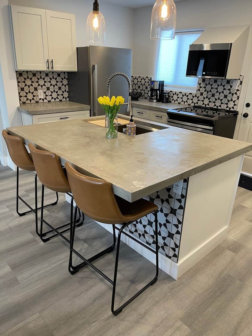 Large, remodeled kitchen with all modern appliances including dishwasher, microwave, oven and disposal. 