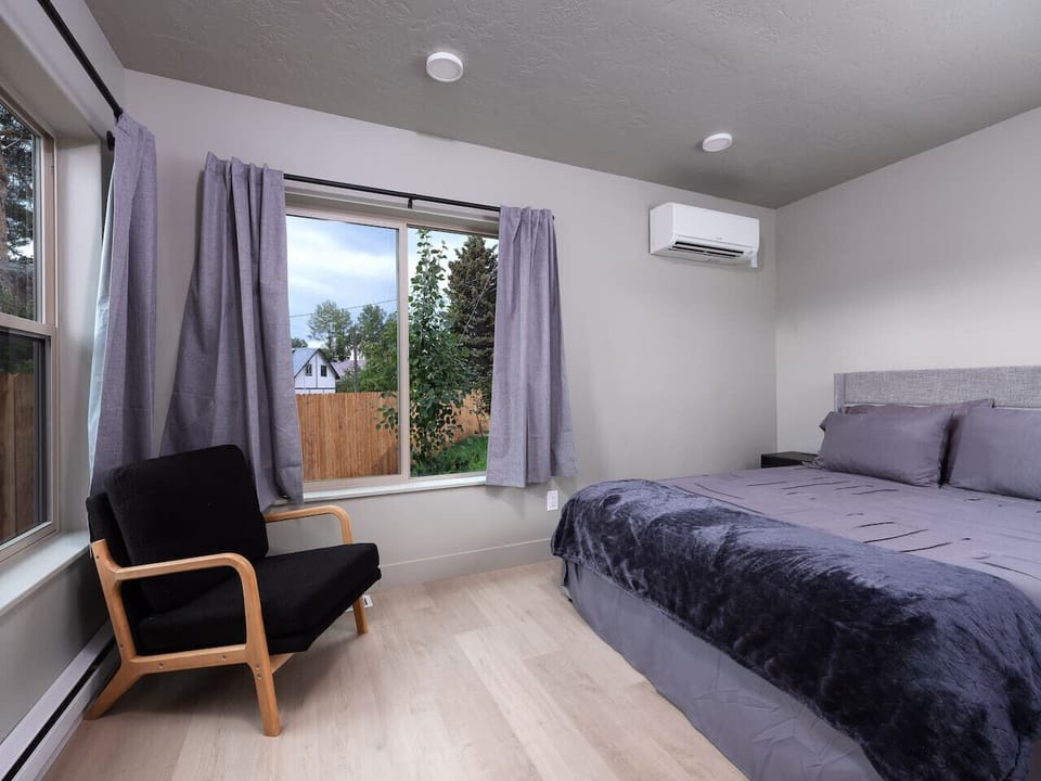 Primary Bedroom & Cozy Chair