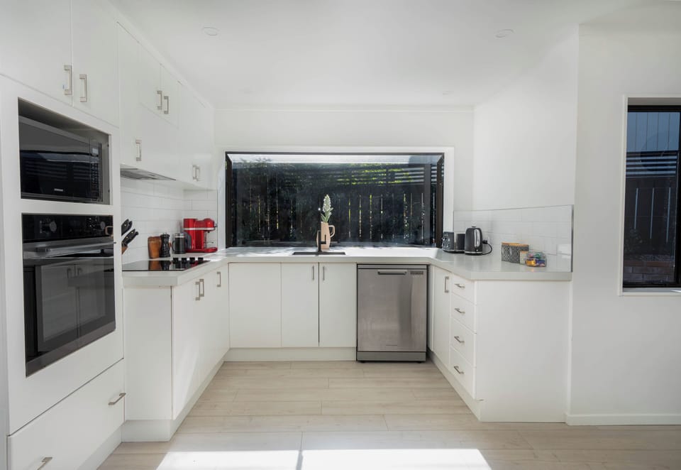 Kitchen with Nespresso Machine (pods provided) and Fisher & Paykel appliances