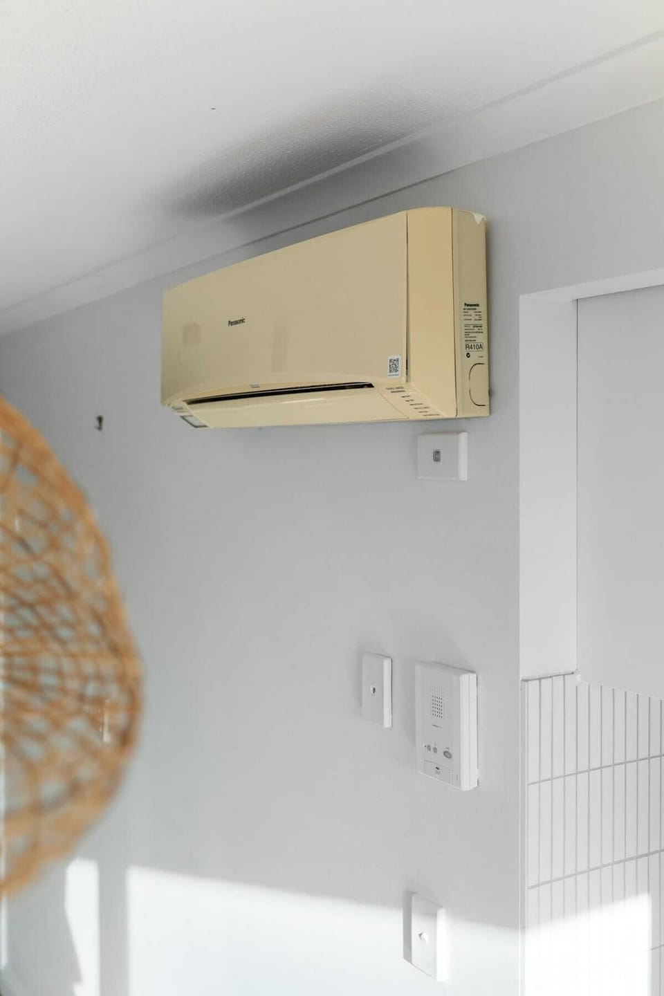Split-system air conditioning in the living room to keep the space cool and comfortable — please note, bedrooms are not air-conditioned.