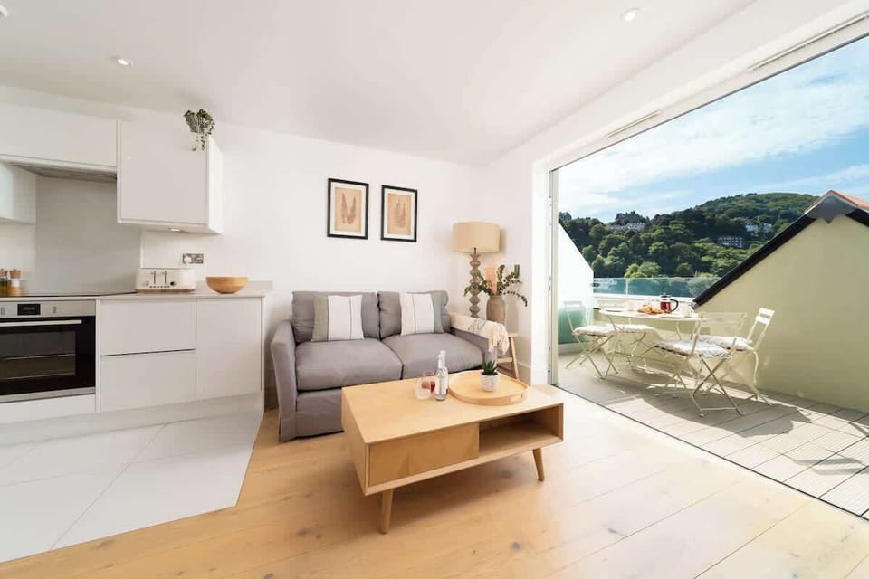 Relax in the spacious living area, that seamlessly leads onto a balcony, providing the ideal setting for enjoying the fresh air and stunning views.