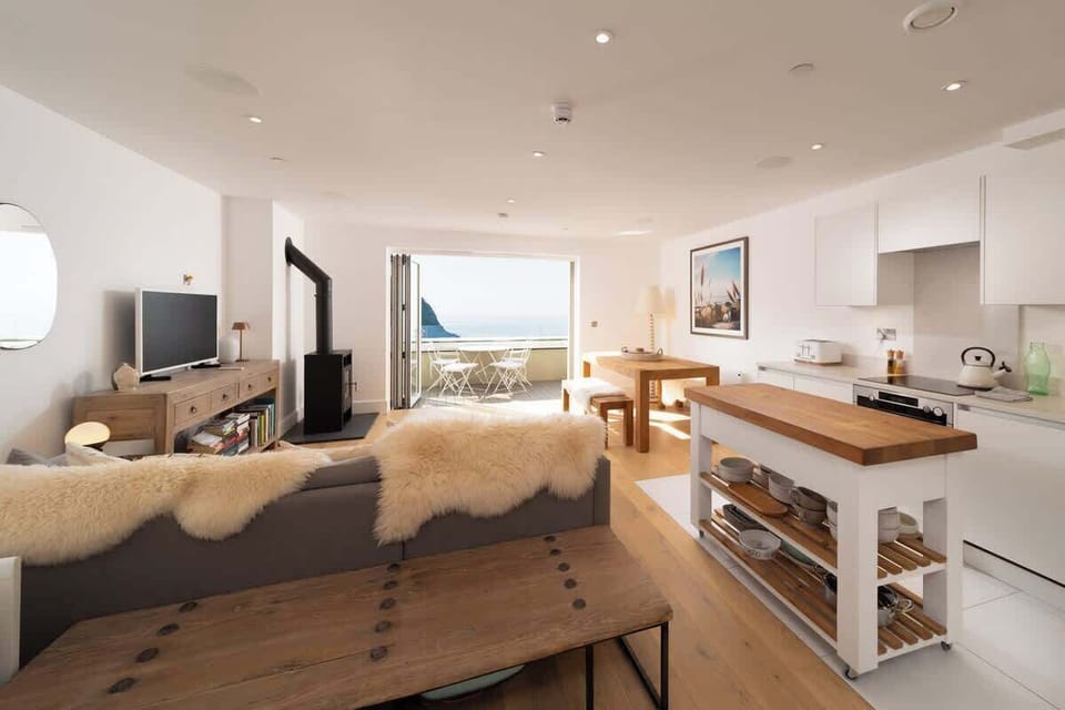 Relax in the open plan living space and take in the stunning sea views.