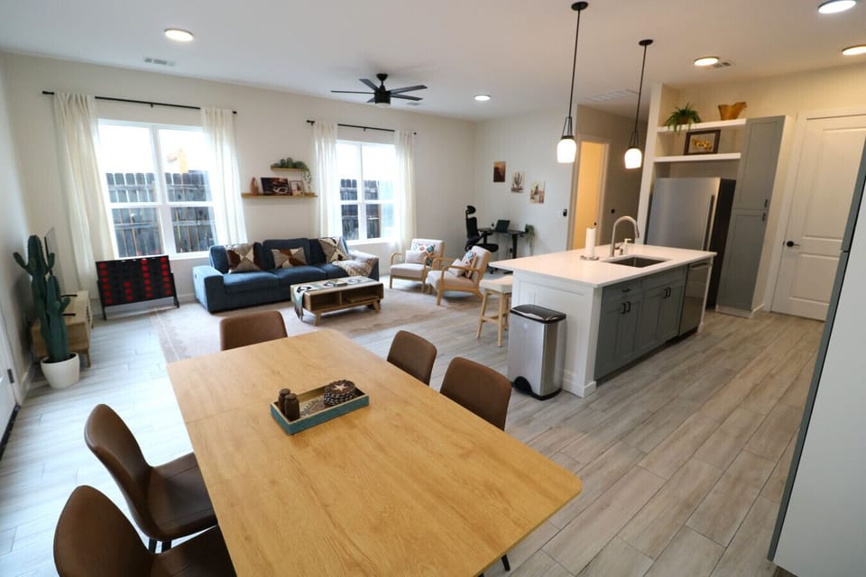 Dining Area with Open Kitchen and Living Room Views