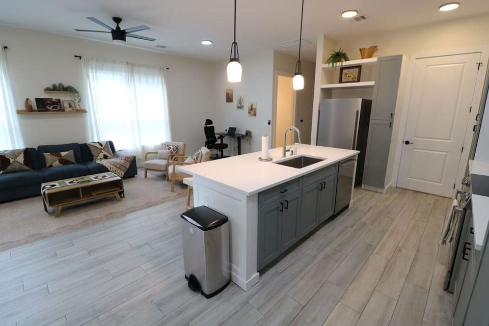 Living Room (Sofa)/ Dining Area / Open Kitchen