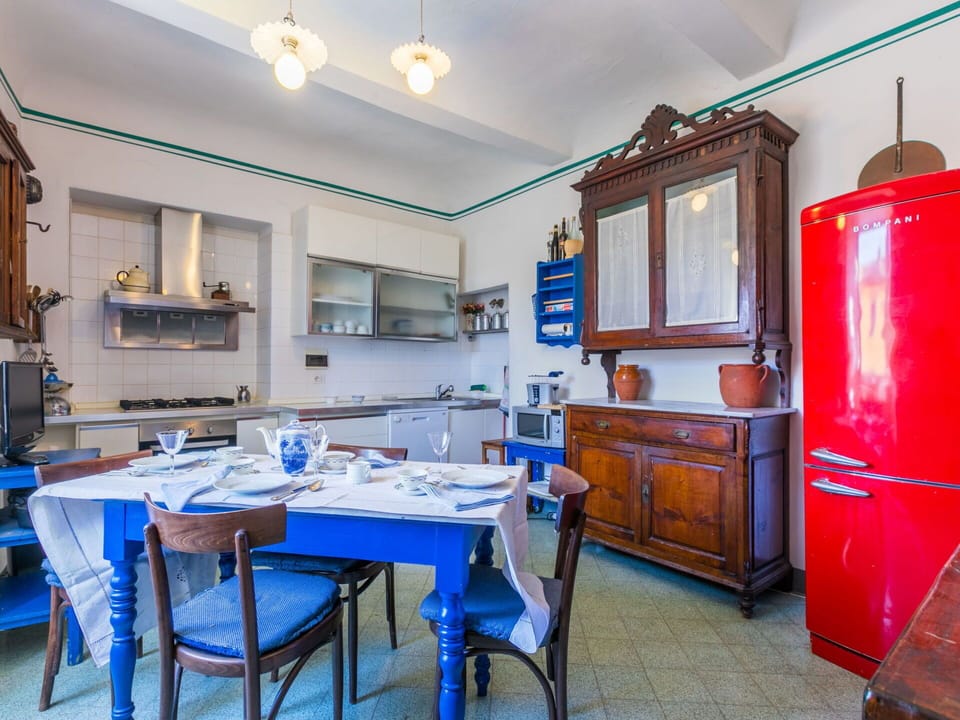 Furniture, Kitchen, Flooring, Interior Design, Lighting, Kitchen Appliance, Floor, Major Appliance, Countertop, Cabinetry