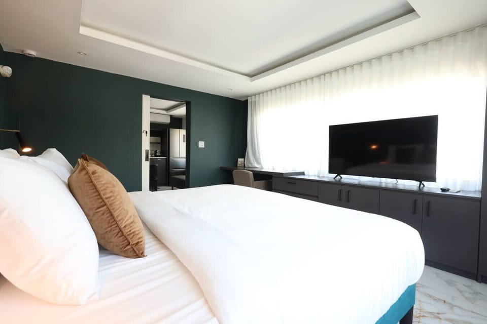 Comfortable king bedroom in apartment style unit