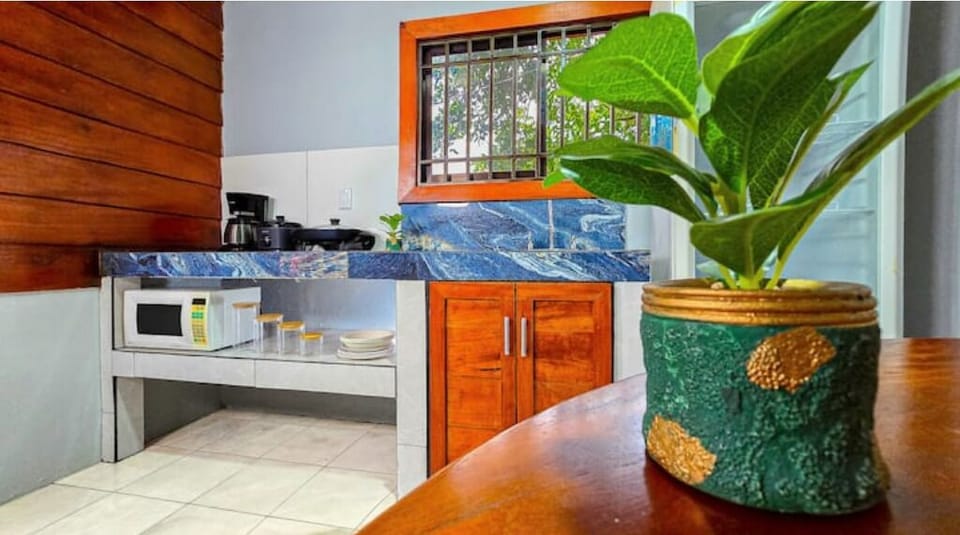 Fully equipped, functional space to comfortably prepare your meals.