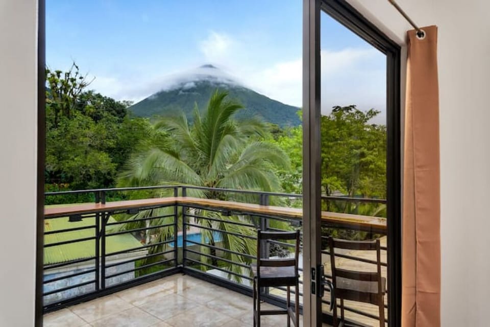 Beautiful Arenal Volcano views from the third-floor room and terrace.