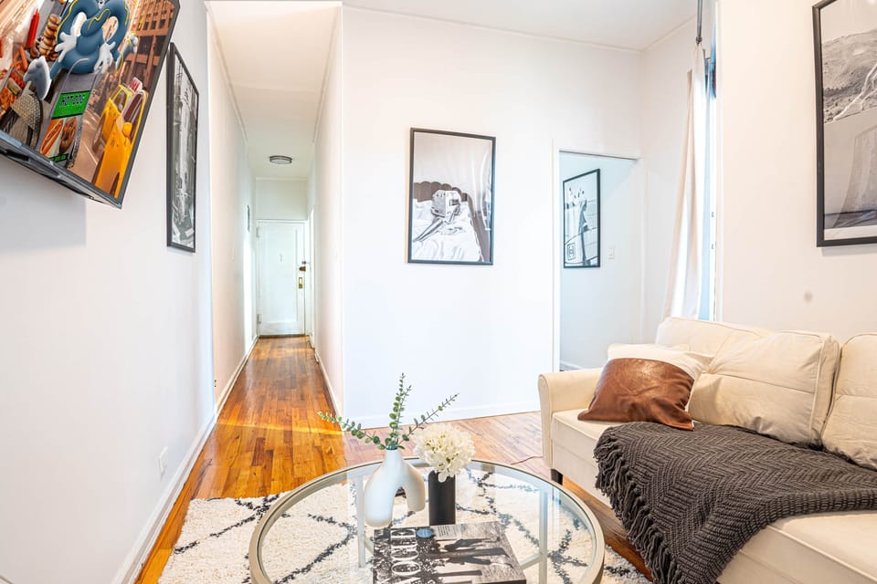 Modern lounge with sofa, TV, and chic decor accents