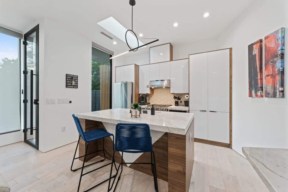 Streamlined kitchenette for your morning coffee or late-night snack cravings.