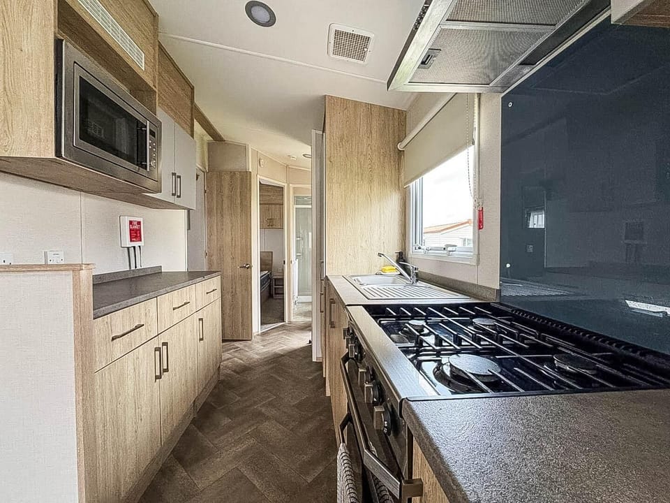 Modern kitchen with sleek appliances and ample storage