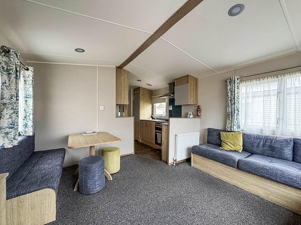 Cozy living area with ample seating and natural light