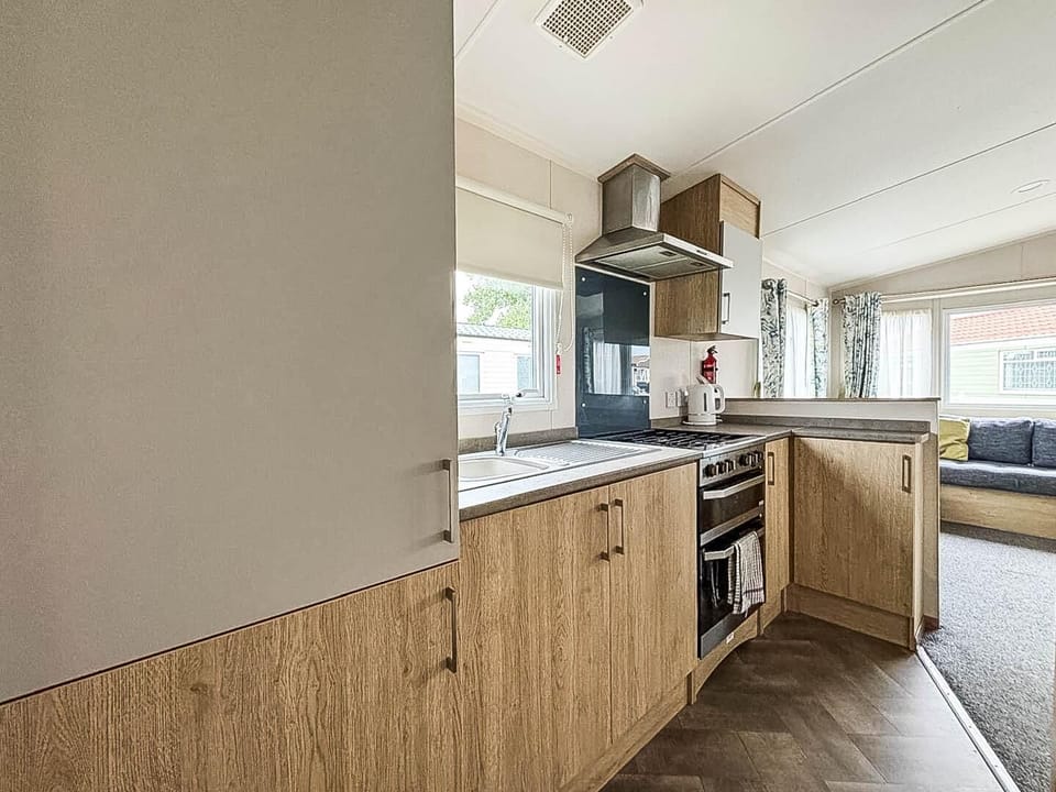 Bright, modern kitchen with ample natural light and storage