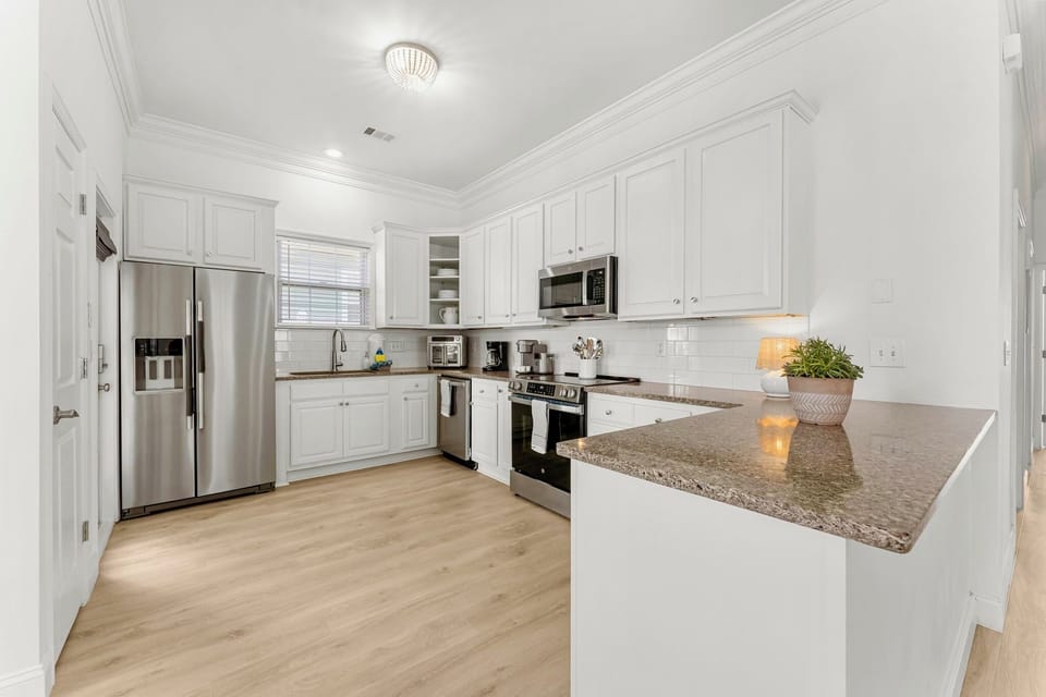 Fully equipped kitchen with new stainless steel appliances 