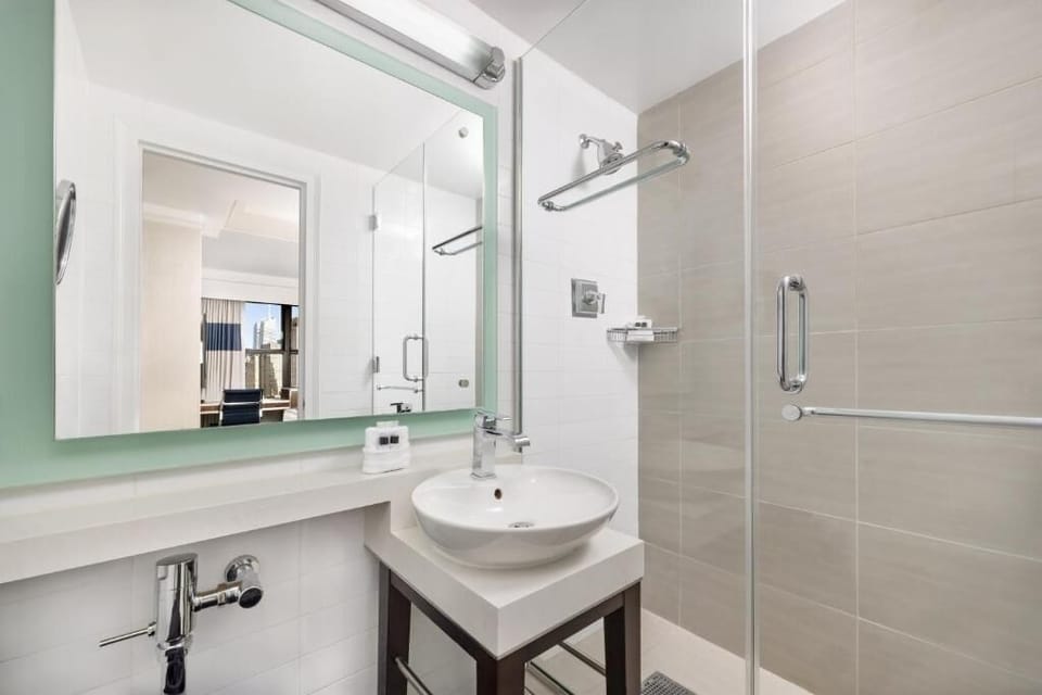 Refresh in a sleek glass shower with spa-like finishes.