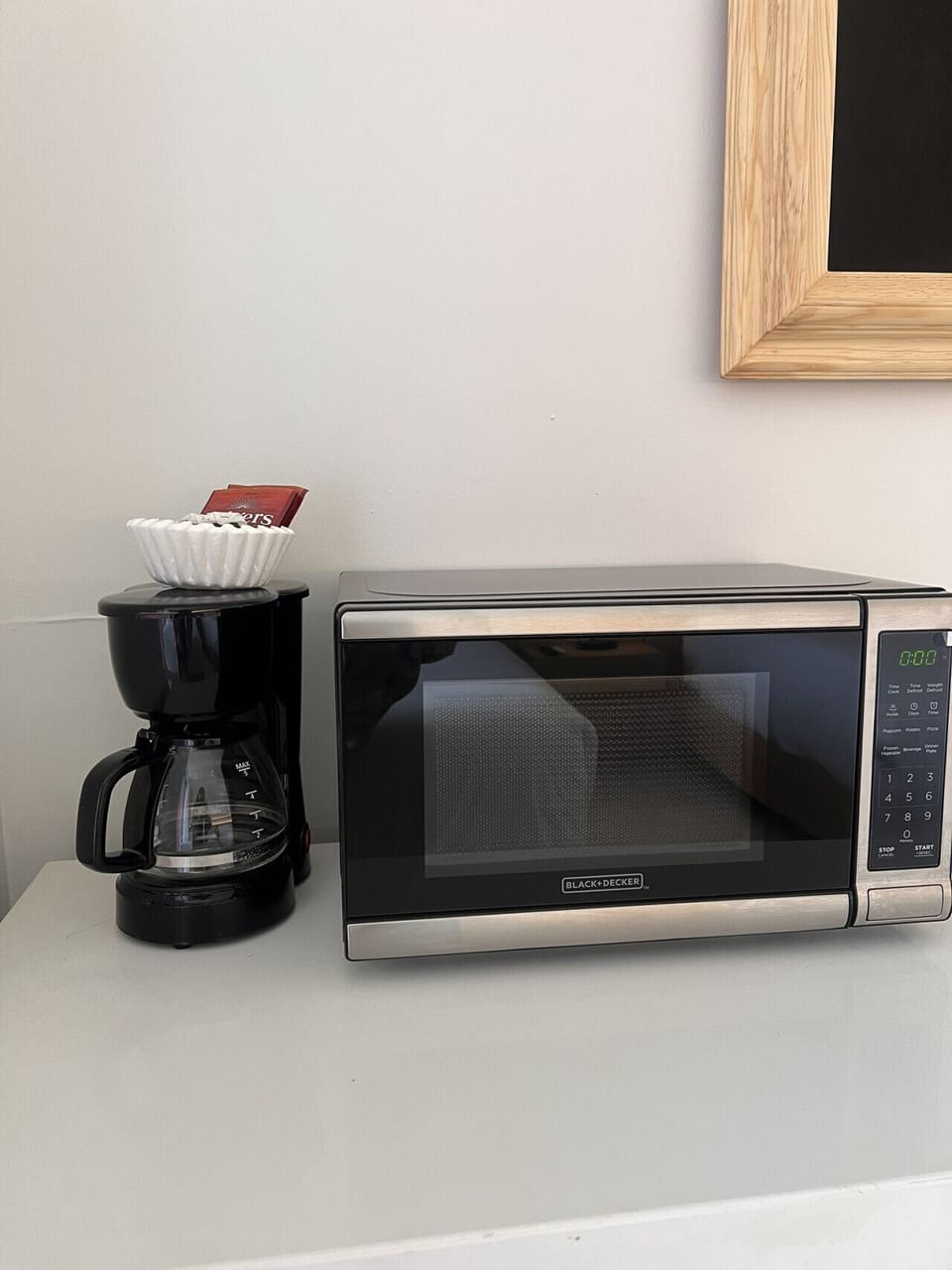 Microwave and coffee maker in the bedroom
