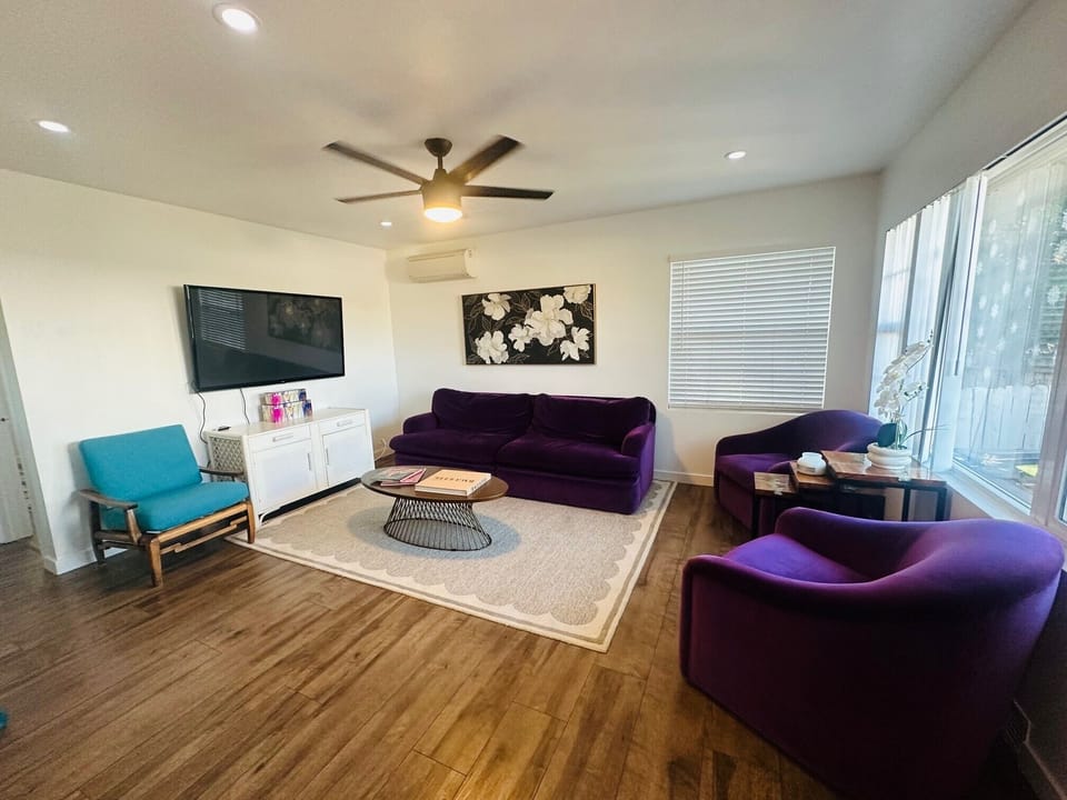 Comfortable living room area with board games, high speed internet, and TV