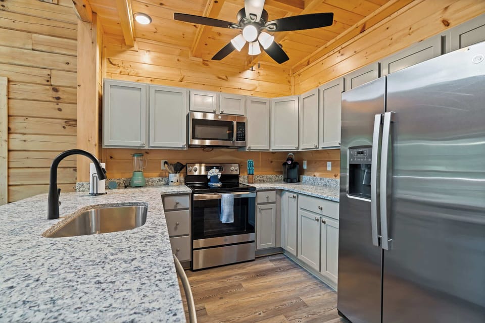Spacious Kitchen with Granite Countertops 