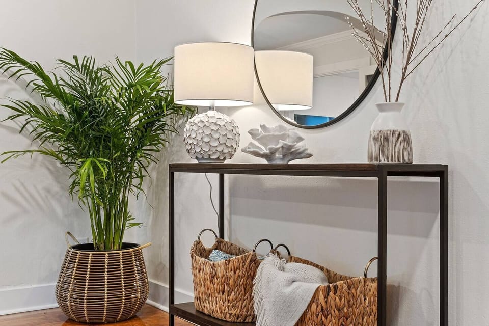 Open floor plan connects living, dining, and kitchen so families stay together while cooking and entertaining in downtown Pensacola.