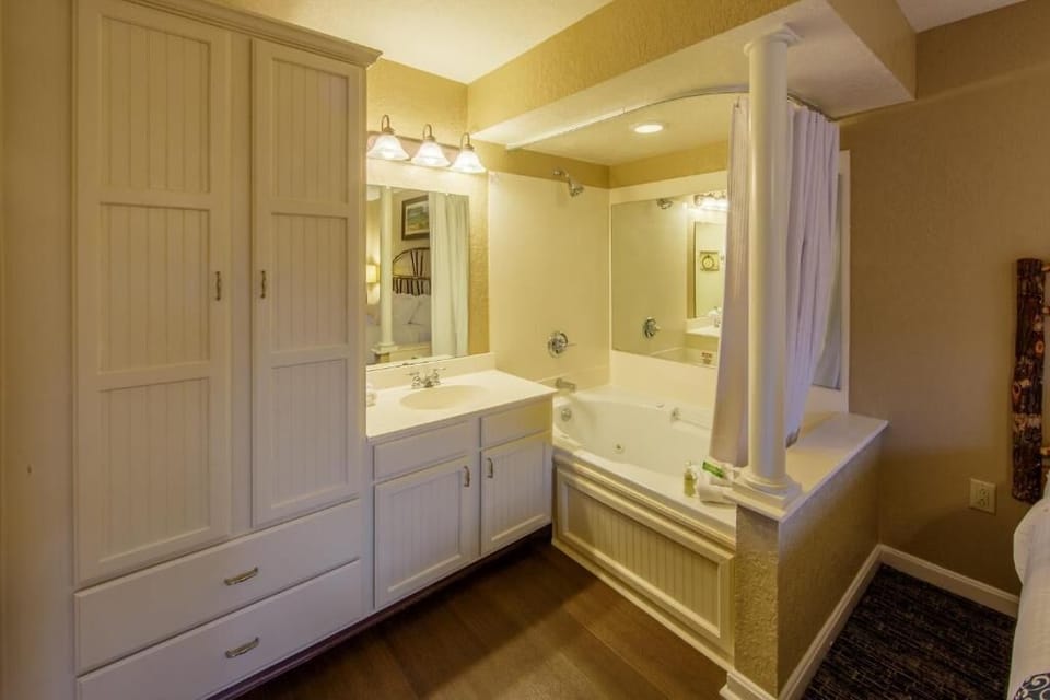 Refresh with a long soak in the deep tub and bright vanity.