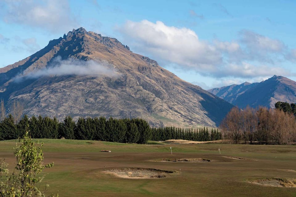 Gaze across the open fairway to iconic Queenstown landscapes.