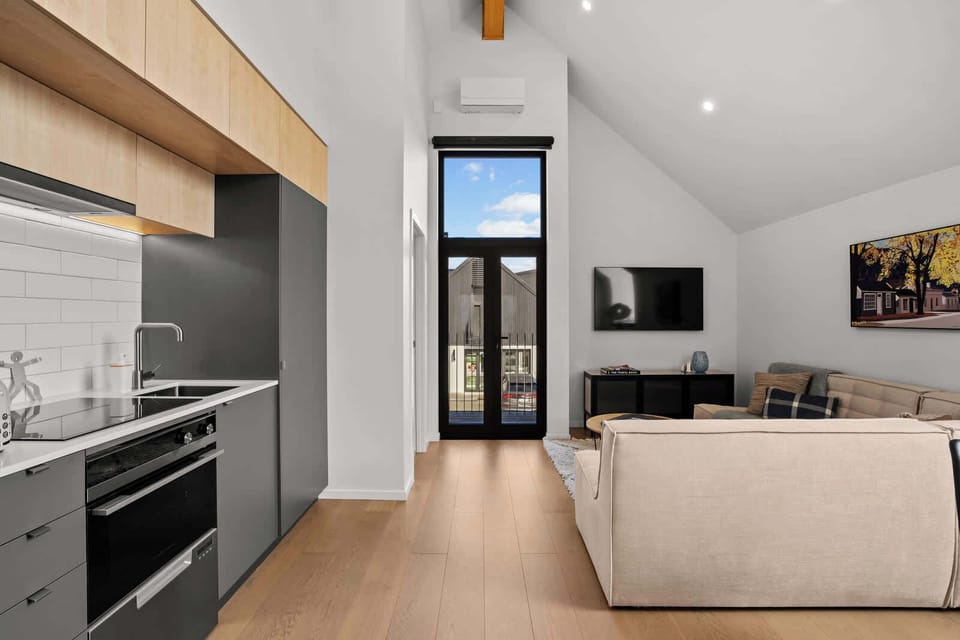 Living room with balcony doors and natural light