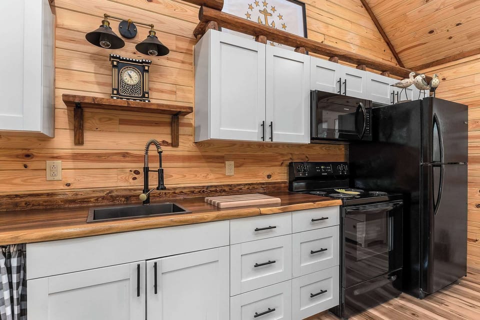 Fully Equipped Kitchen - Enjoy the convenience of a full kitchen with stove, oven, microwave, refrigerator, and all the essentials.