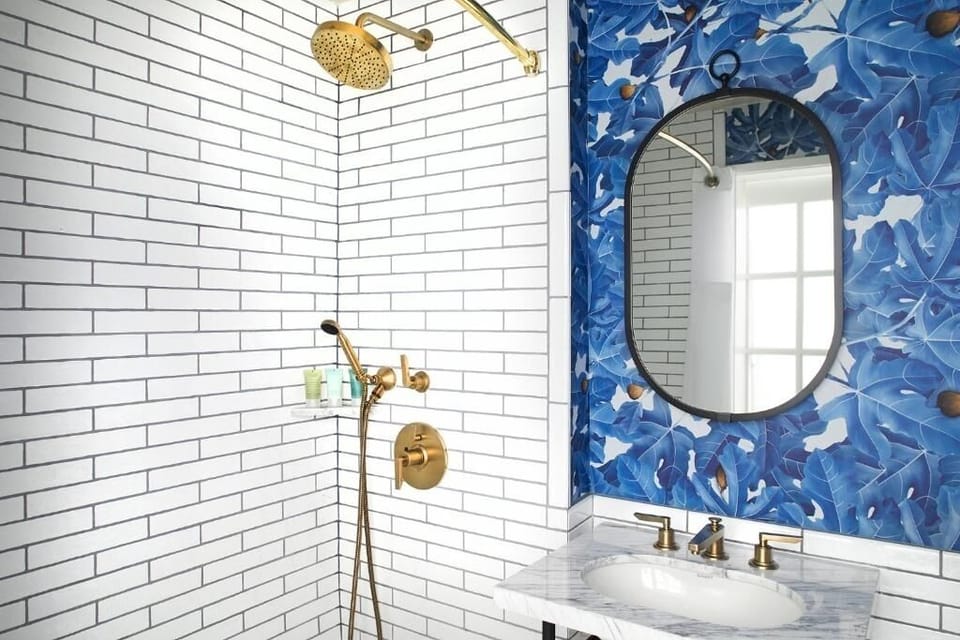 Refresh under a spa-like rain shower with luxe brass details.