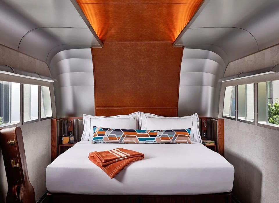 Unwind in a one-of-a-kind suite with cozy linens.