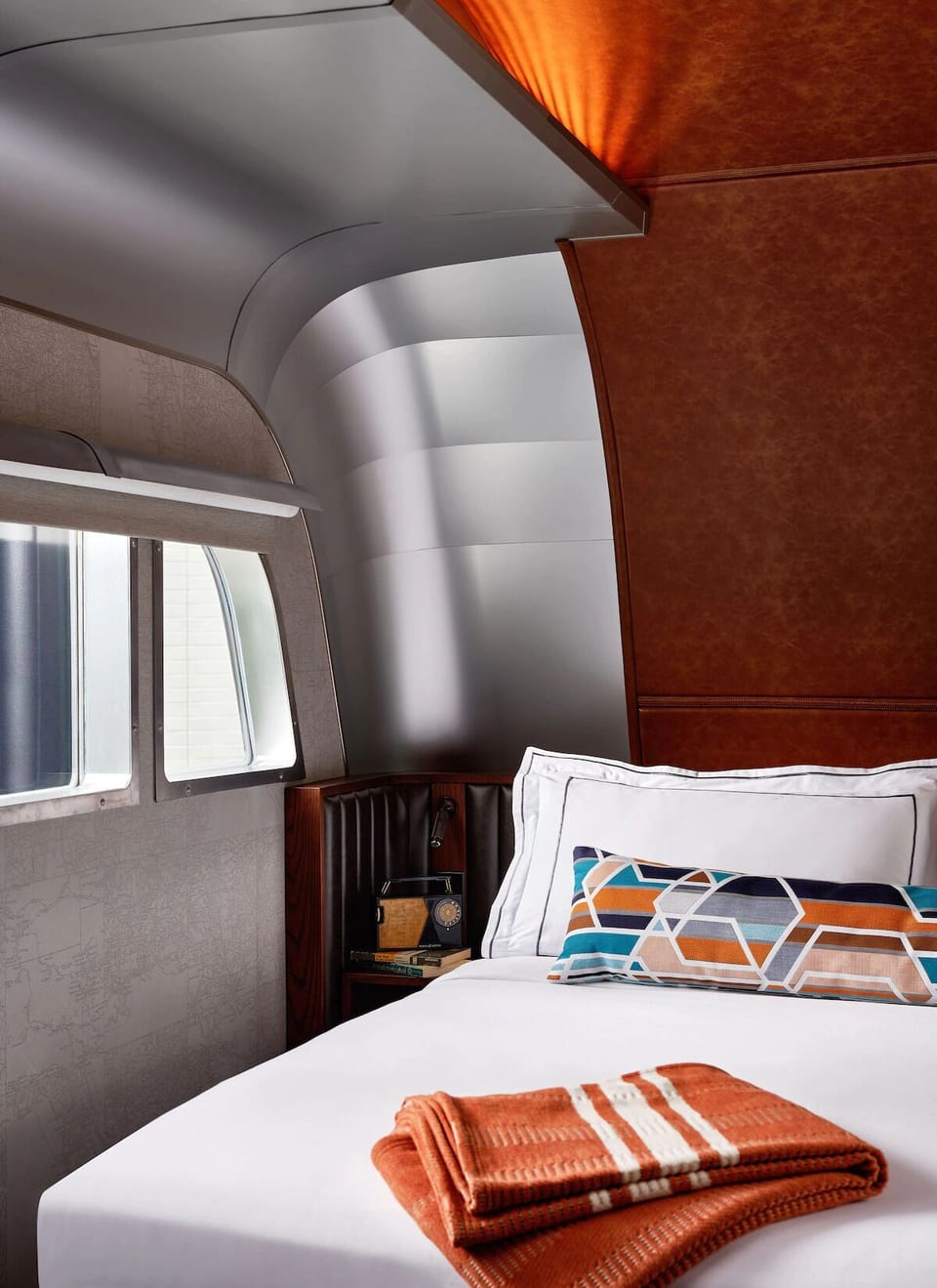 Drift off beneath warm tones in a snug sleeping nook.