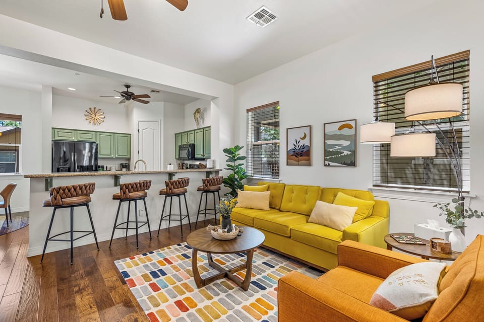 Opening living space to the bar and kitchen area for entertaining and relaxing