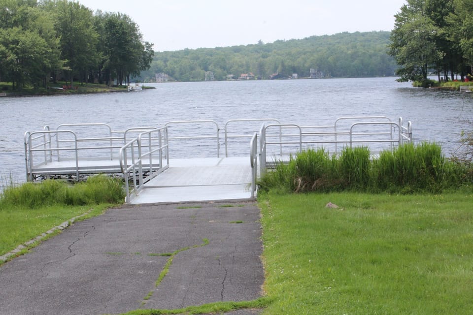 Boat dock for electric boats and fishing access