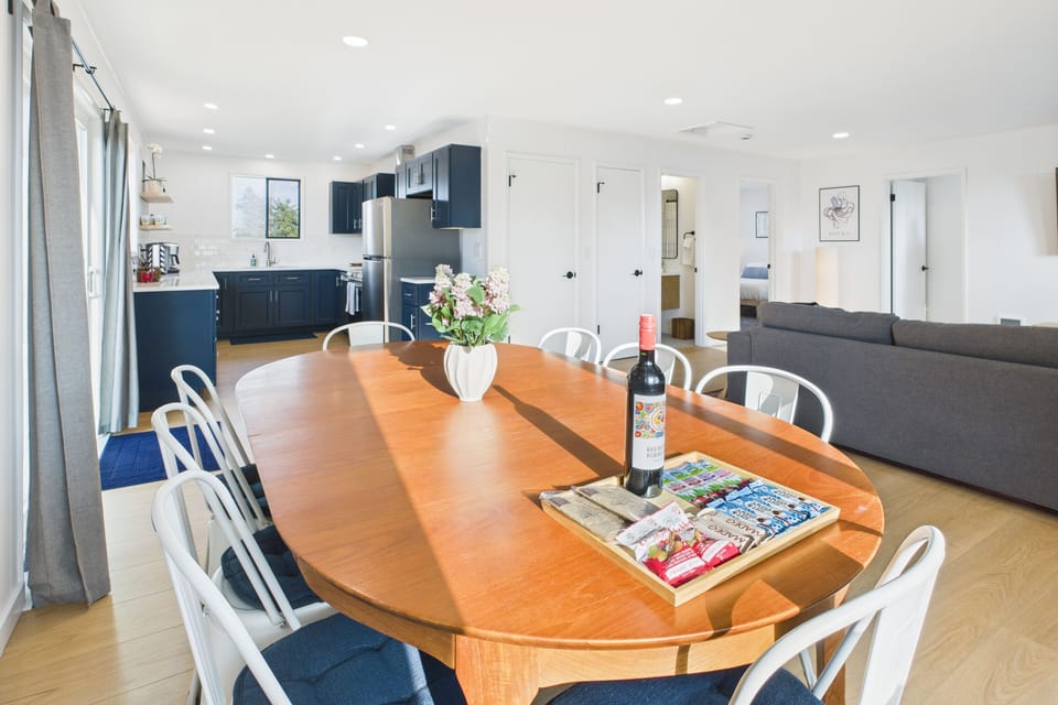 Large dining table can comfortably seat 8-9 people