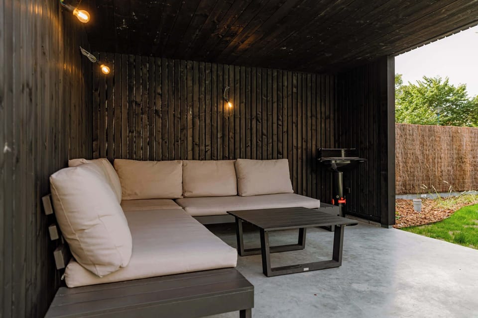 Covered Outdoor Lounge with Comfortable Seating