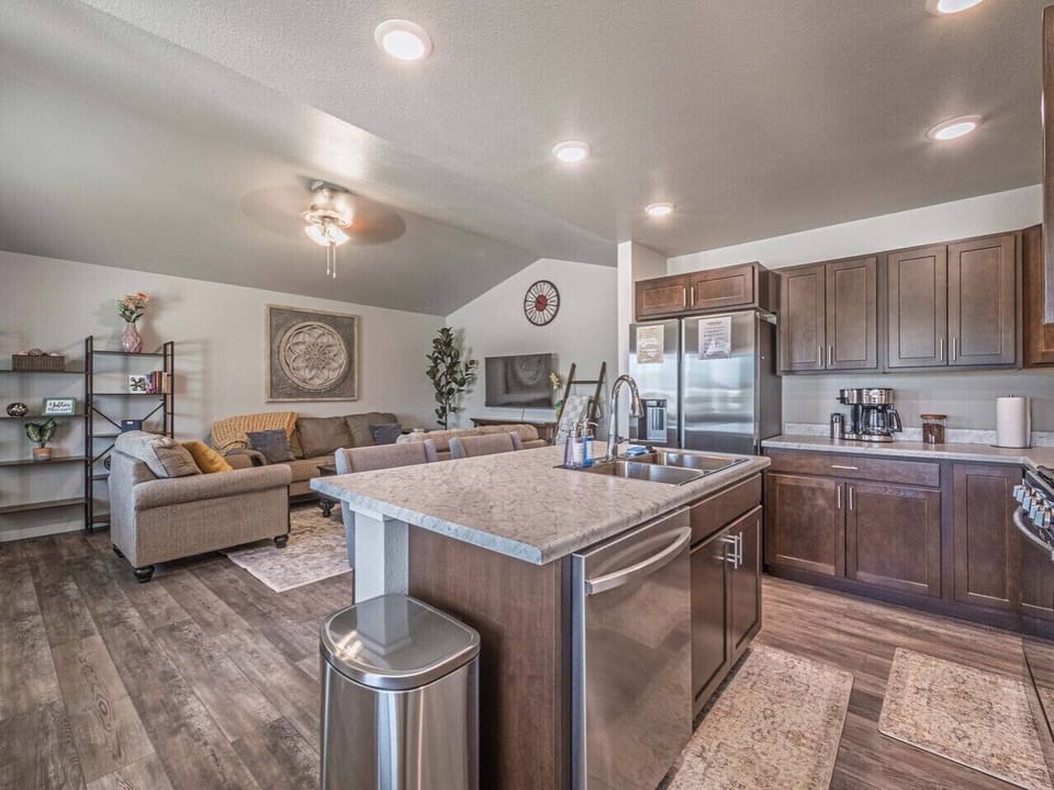 The island counter gives you extra prep space and room to gather around while cooking or entertaining.
