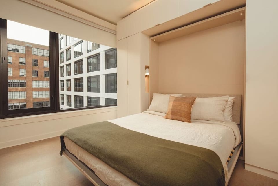 Unit with 1 Queen Bed and 1 Queen Murphy Bed
