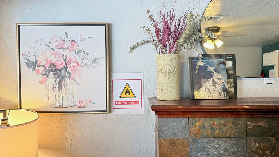 Please note the fireplace is not in use — enjoy the stylish hearth and cozy ambiance while staying safe.