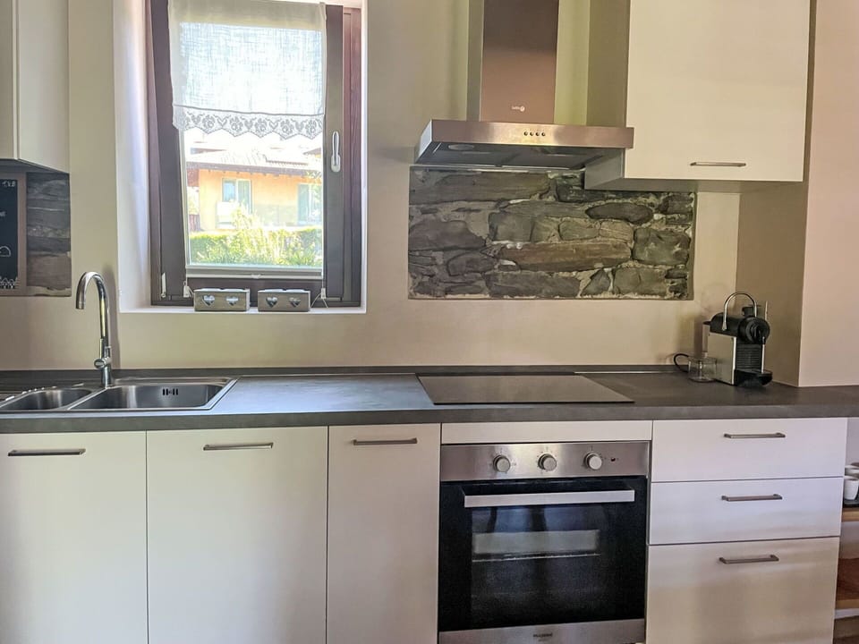 Countertop, Kitchen, Kitchen Appliance, Cabinetry, Flooring, Major Appliance, Interior Design, Home Appliance, Furniture, Drawer