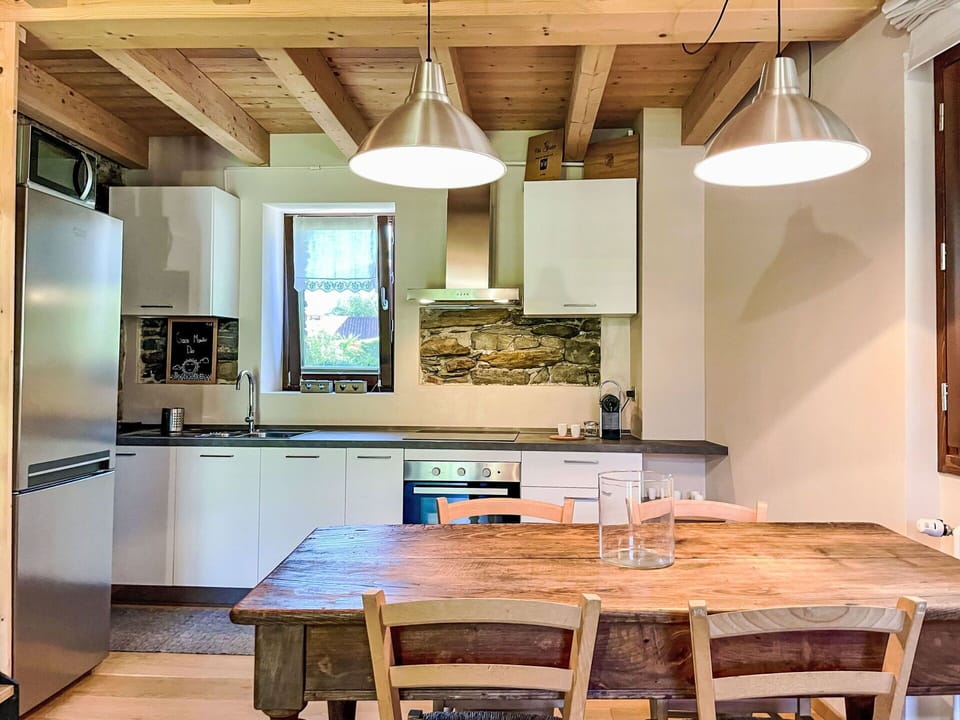 Furniture, Interior Design, Kitchen, Flooring, Countertop, Wood, Ceiling, Light Fixture, Kitchen Appliance, Floor