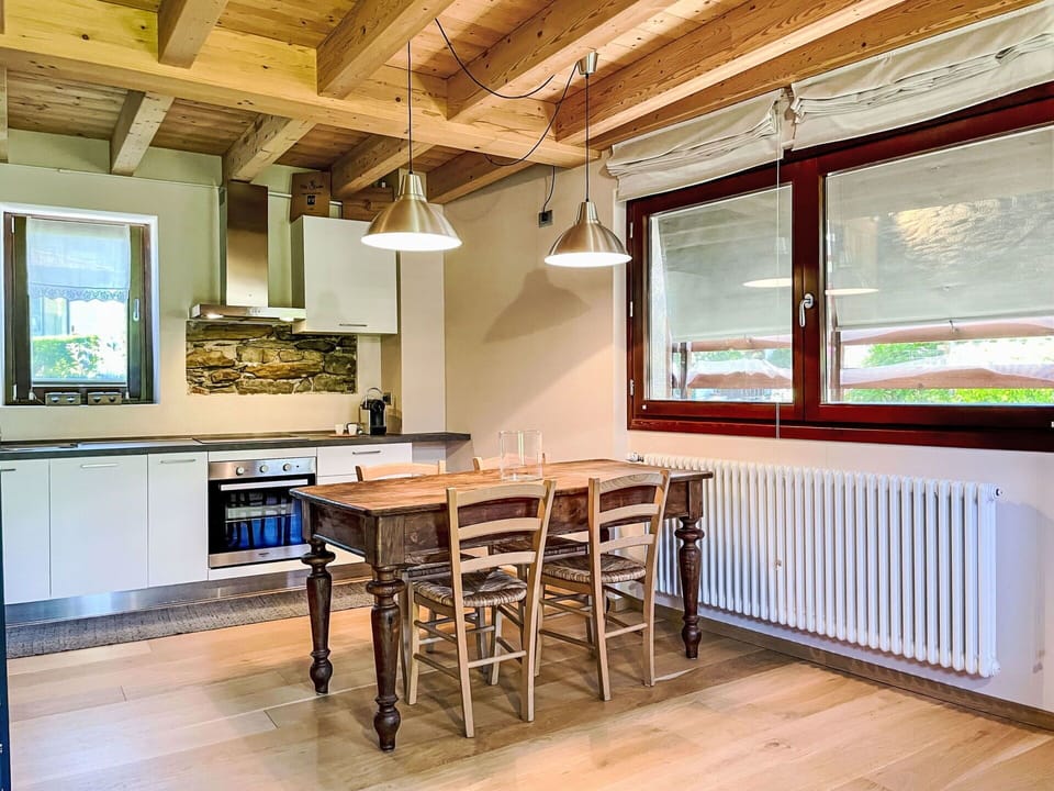 Furniture, Interior Design, Flooring, Wood, Floor, Ceiling, Room, Kitchen, Countertop, Lighting