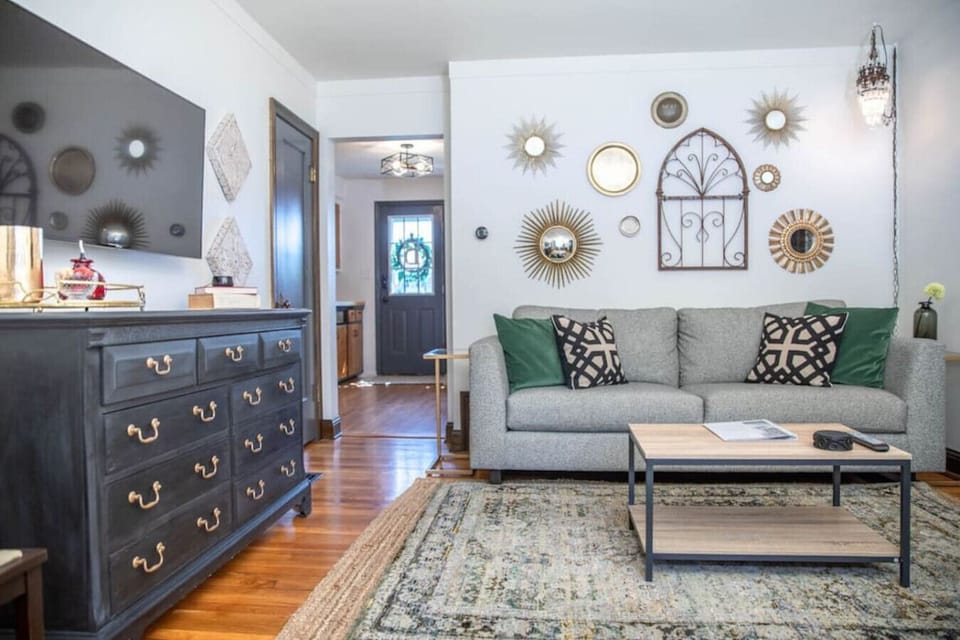 This one bedroom apartment has a comfy living room with extra storage, a Smart TV, and a dedicated work space.