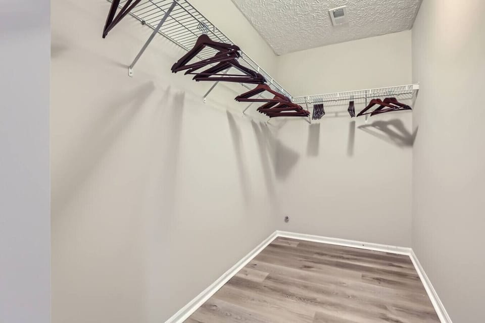 A spacious wardrobe offering ample storage for clothing and personal items.