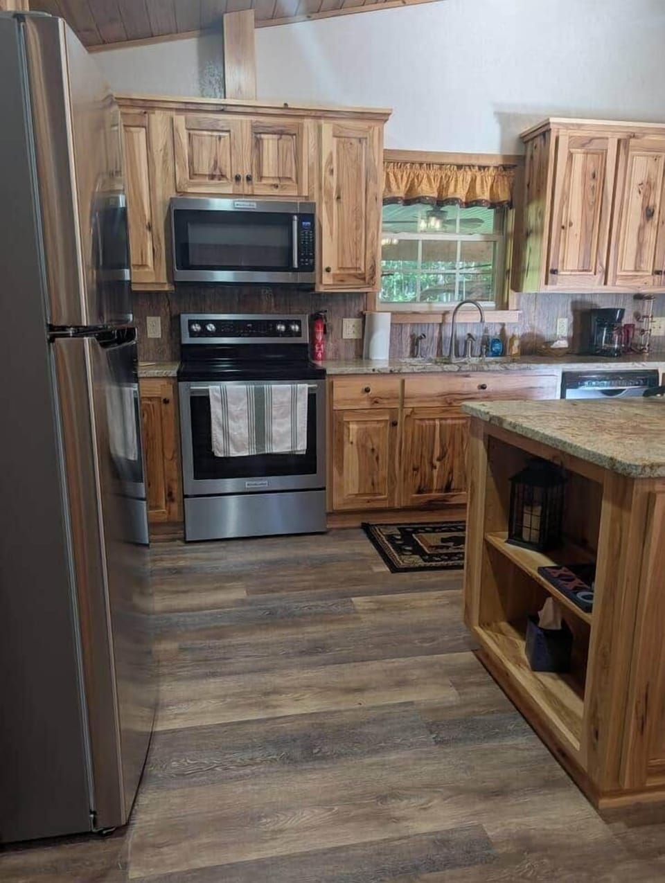 Full Kitchen with full size refrigerator, stove with oven , microwave and dishwasher. Coffee pot and toaster are also available.  Papertowels, dish clothes, and dish towels, dish soap and dishwasher soap. 
